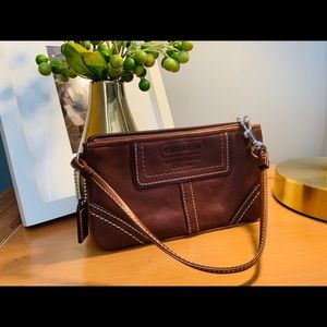 Coach Leather Wristlet, brown.